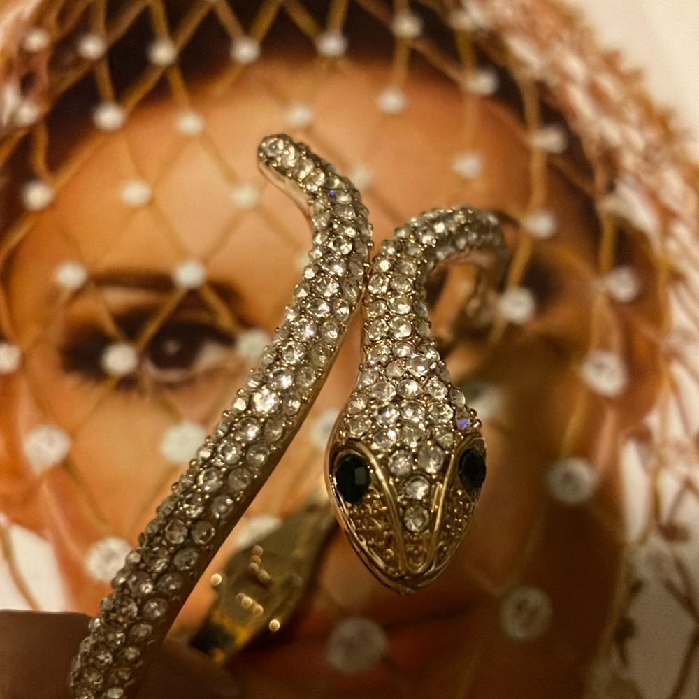 Beautiful, gold snake 🐍 bracelet with rhinestones.